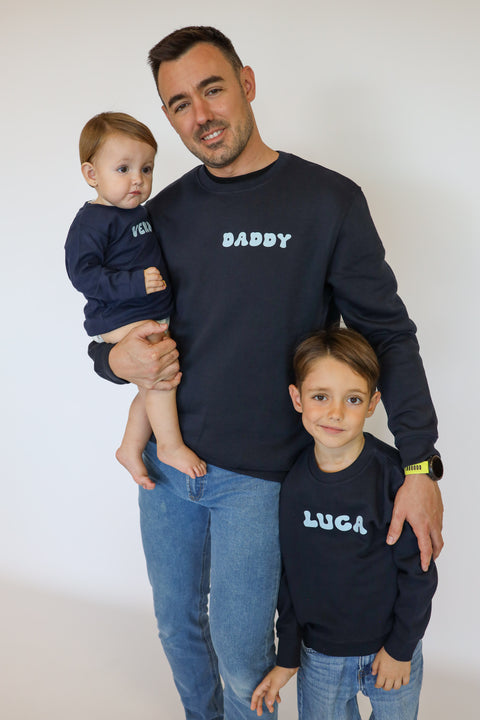 Conjunto familiar de sudaderas Surfer azul marino y prenda de bebé